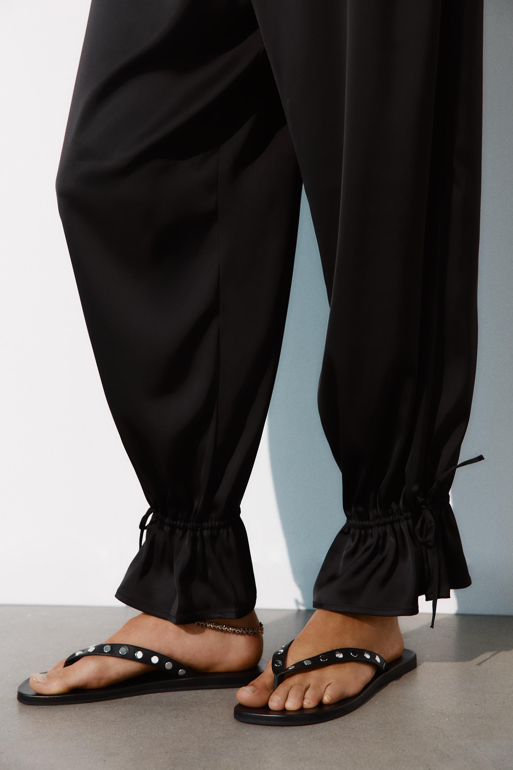 PANTALON BOUFFANT À RAYURES ET NŒUDS